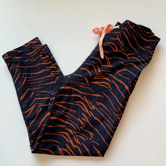The Upside - S, navy/orange animal print leggings - Picture 1 of 5